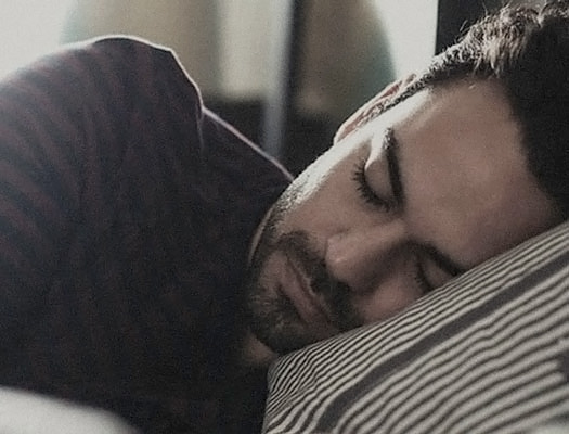 Close up of man sleeping in bed