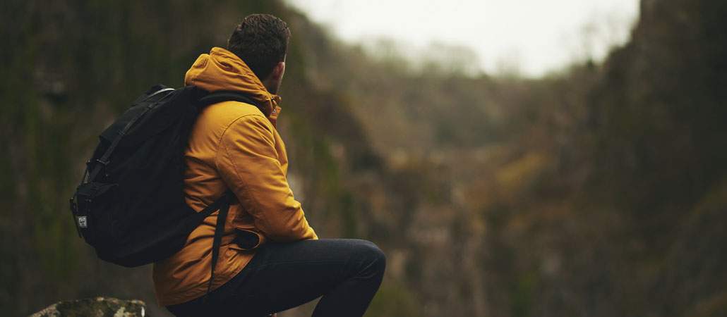 man resting during hike