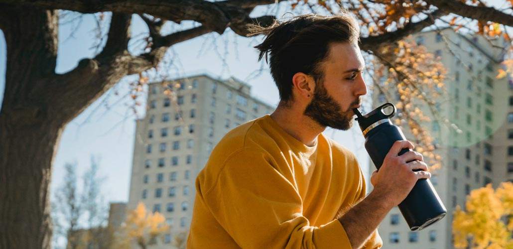 Man drinking from water bottle